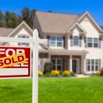 Sold Home For Sale Real Estate Sign and House