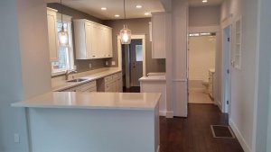 Unbelievable! Opened up the space with a brand new kitchen with new appliances installed shortly after this picture.
